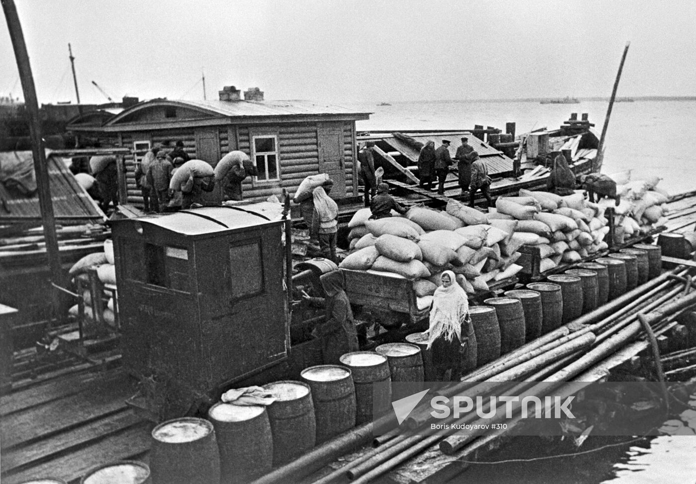 WWII BARGE BARRELS BAGS