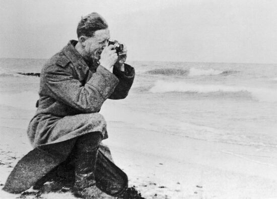 PRESS PHOTOGRAPHER