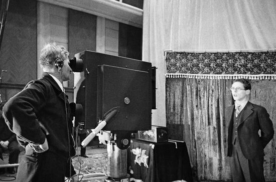 Filming radio announcer Yuri Levitan in a studio