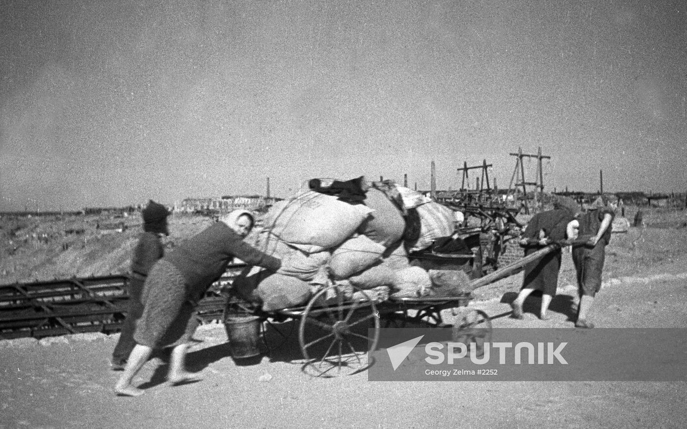 WWII WOMEN REFUGEES BELONGINGS CART