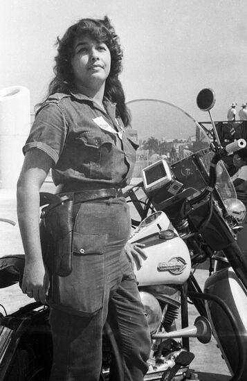 GIRL POLICE OFFICER MOTORCYCLE HAVANA