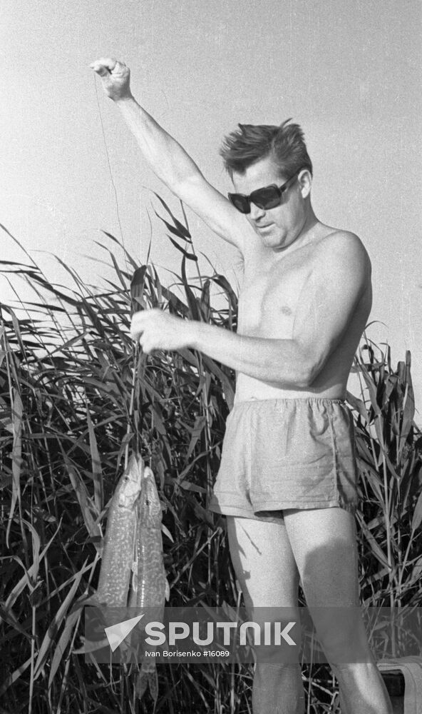 Cosmonaut Andriyan Nikolayev displays his catch