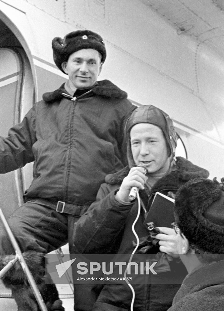 Cosmonauts Belyaev and Leonov being interviewed upon landing 