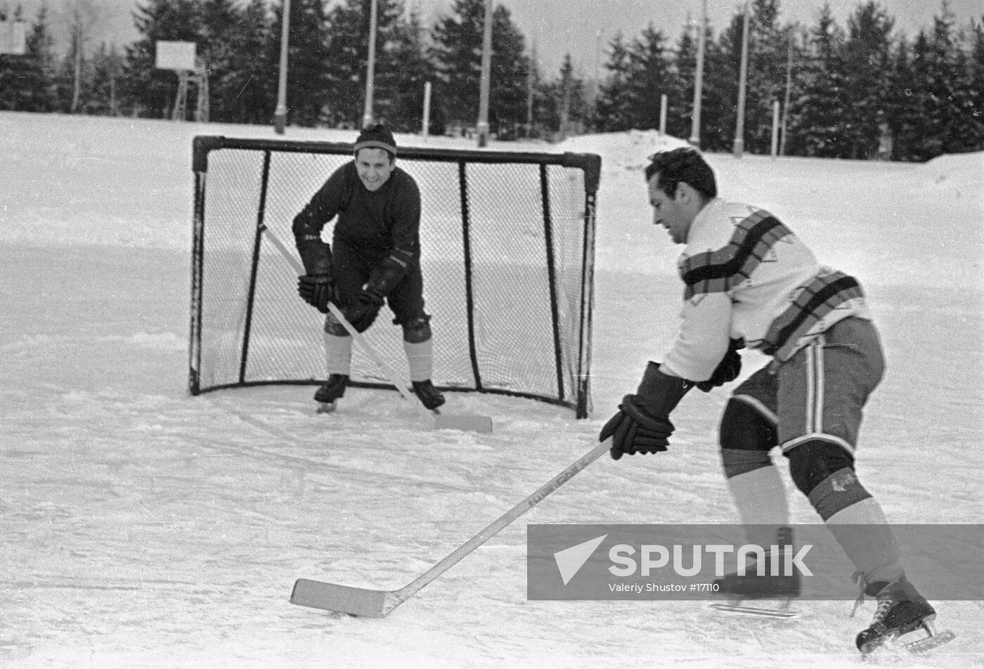 Titov and Popovich Play Ice Hockey