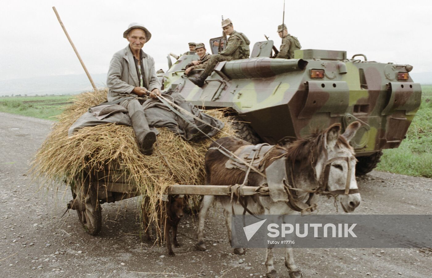 LOCAL HAY CART DONKEY FIGHTERS PATROLLING ARMORED TROOP-CARRIER