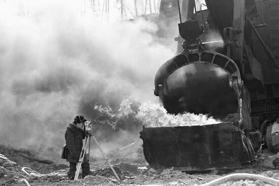 EXCAVATOR SCOOP HEATING