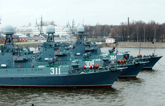 Naval ships in Kronshtadt port prepared for voyage