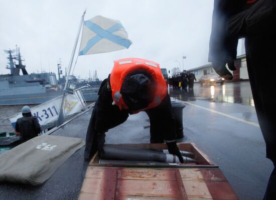 Naval ships in Kronshtadt port prepared for voyage