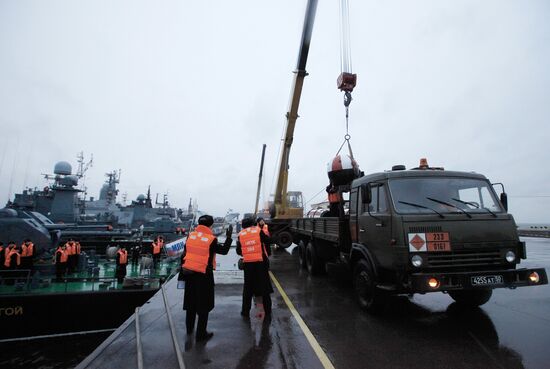 Naval ships in Kronshtadt port prepared for voyage