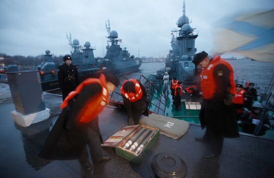 Naval ships in Kronshtadt port prepared for voyage