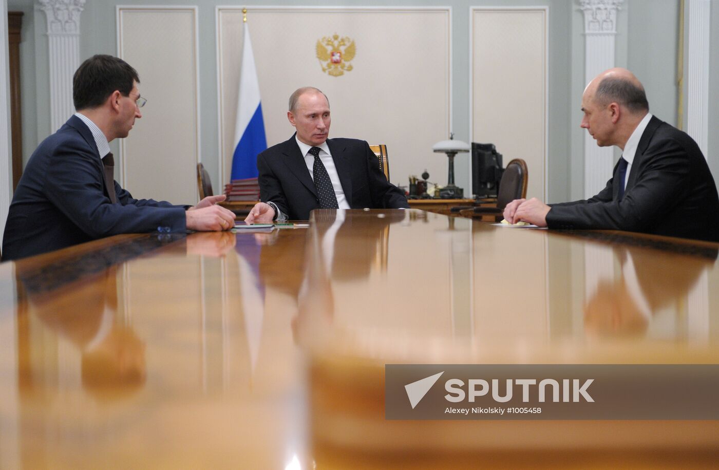 Vladimir Putin meets with Igor Shchegolev and Anton Siluanov