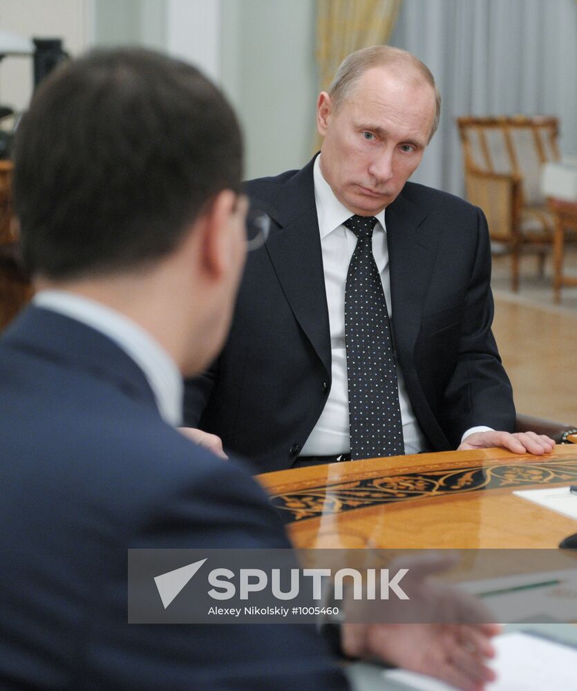 Vladimir Putin meets with Igor Shchegolev and Anton Siluanov