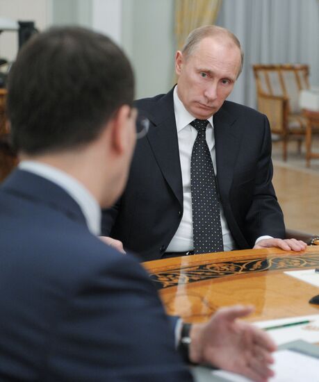 Vladimir Putin meets with Igor Shchegolev and Anton Siluanov