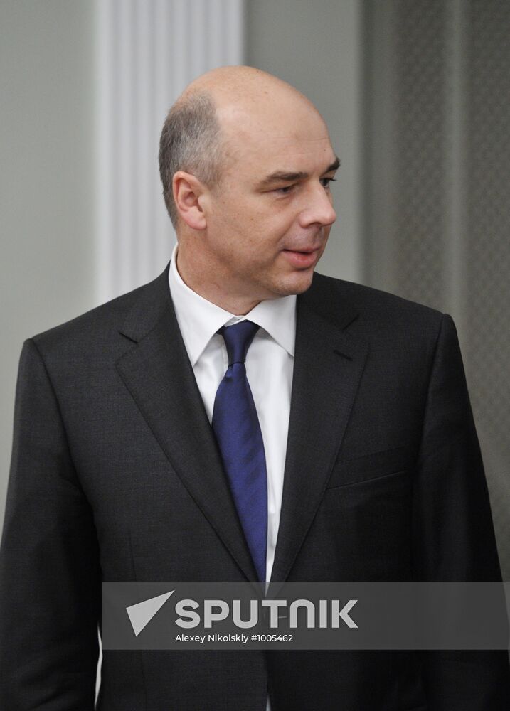 Vladimir Putin meets with Igor Shchegolev and Anton Siluanov
