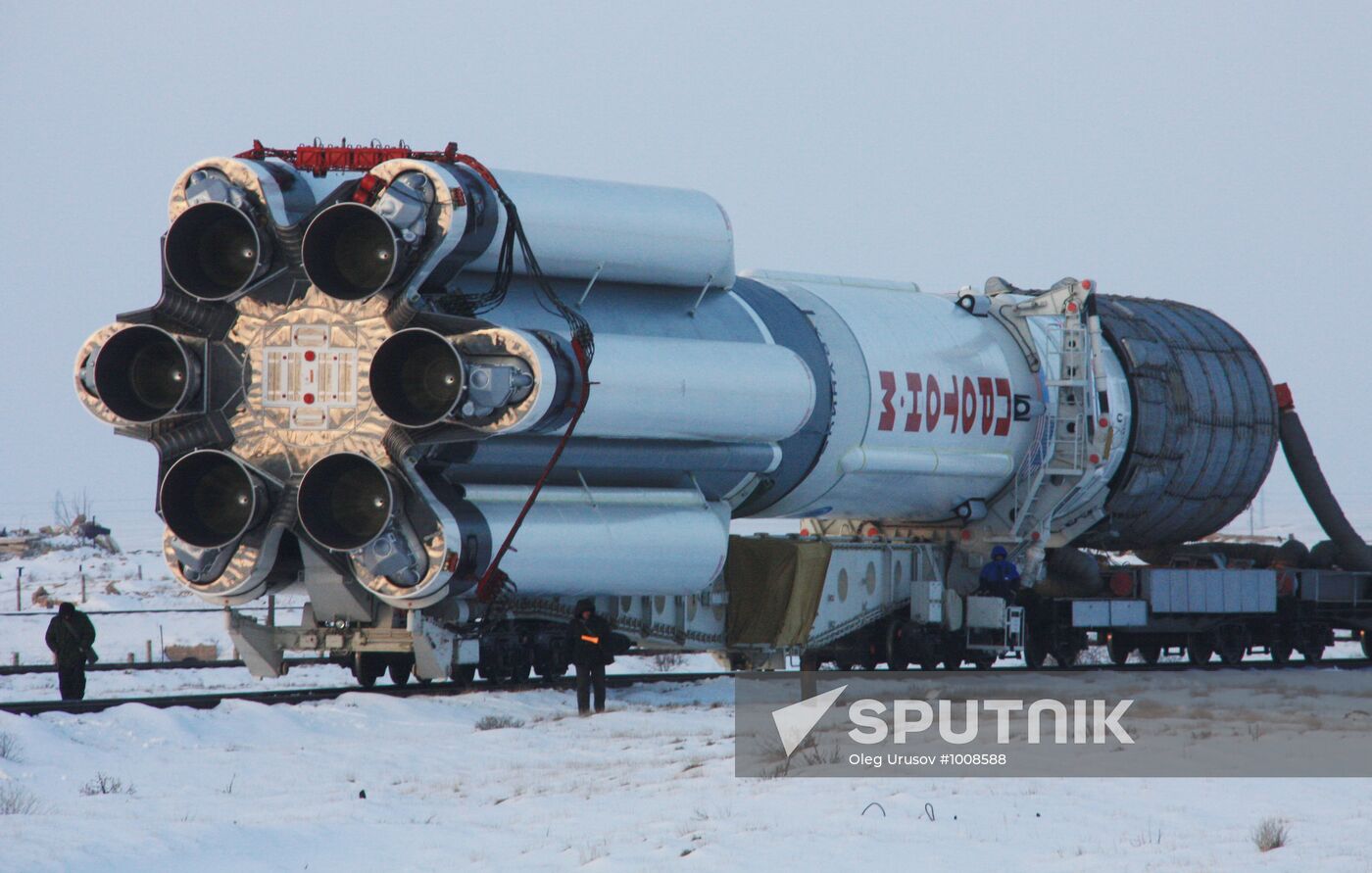 Proton M missile carried to Baikonur launchpad