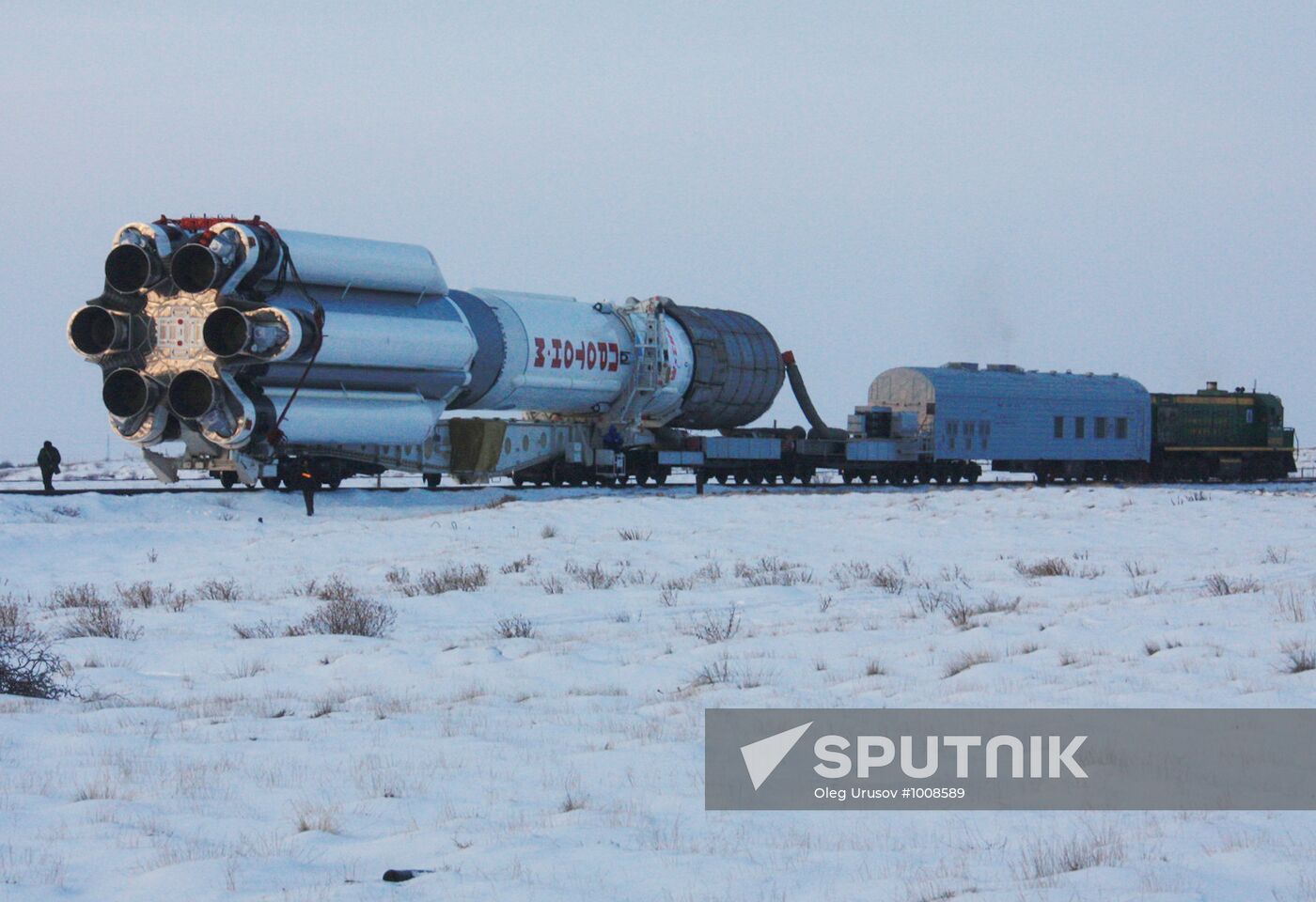 Proton M missile carried to Baikonur launchpad