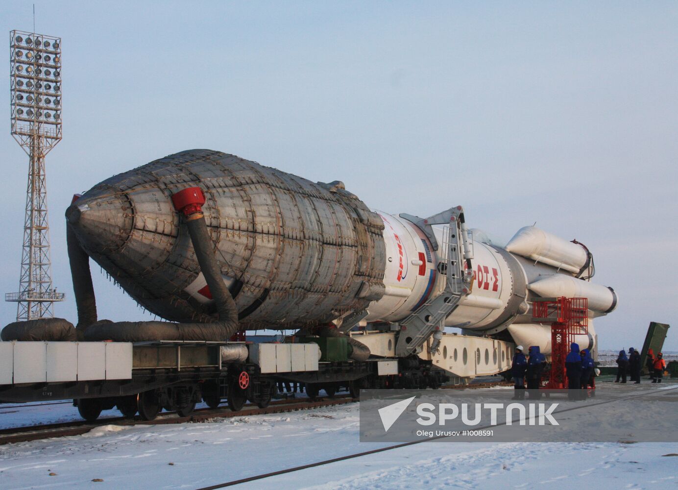 Proton M missile carried to Baikonur launchpad
