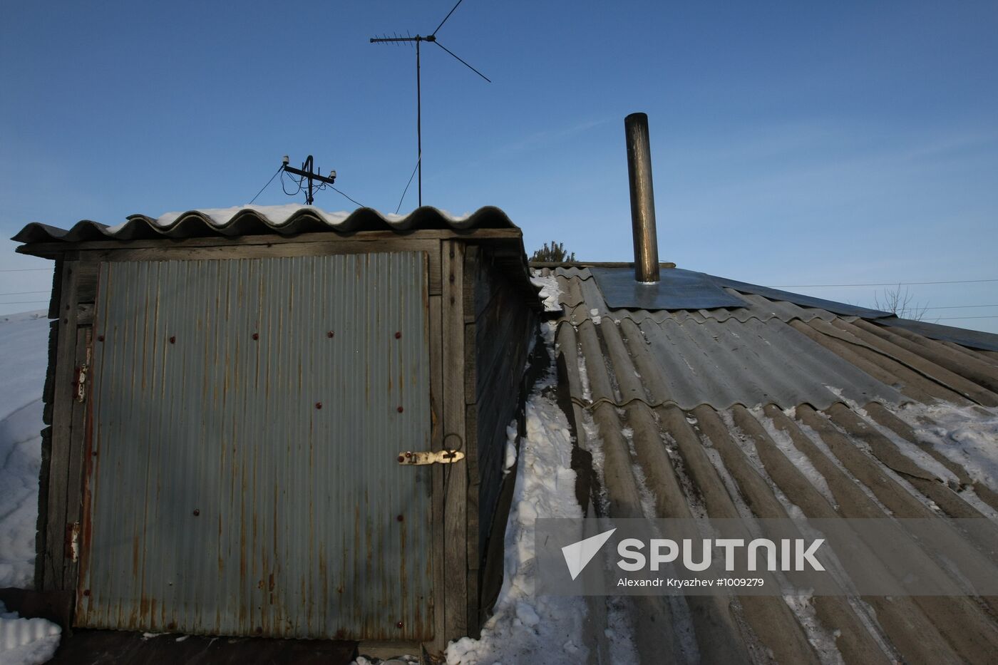 The house in Cosmonauts Street in the village of Vagaitsevo, Ordynskoye District, Novosibirsk Region, on whose roof presumed fragments of the Meridian double-purpose satelitte fell. Location: Russia, Novosibirsk Region. Author: Alexandr Kryazhev/Sputnik. Fragments of Meridian spacecraft searched in Novosibirsk Region