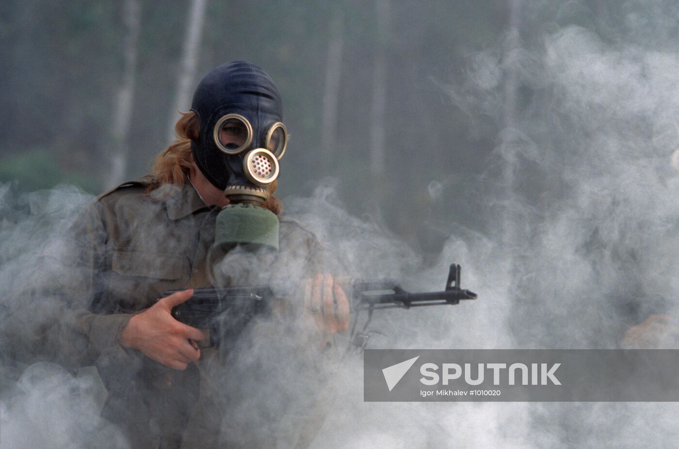 Female student at military exercises
