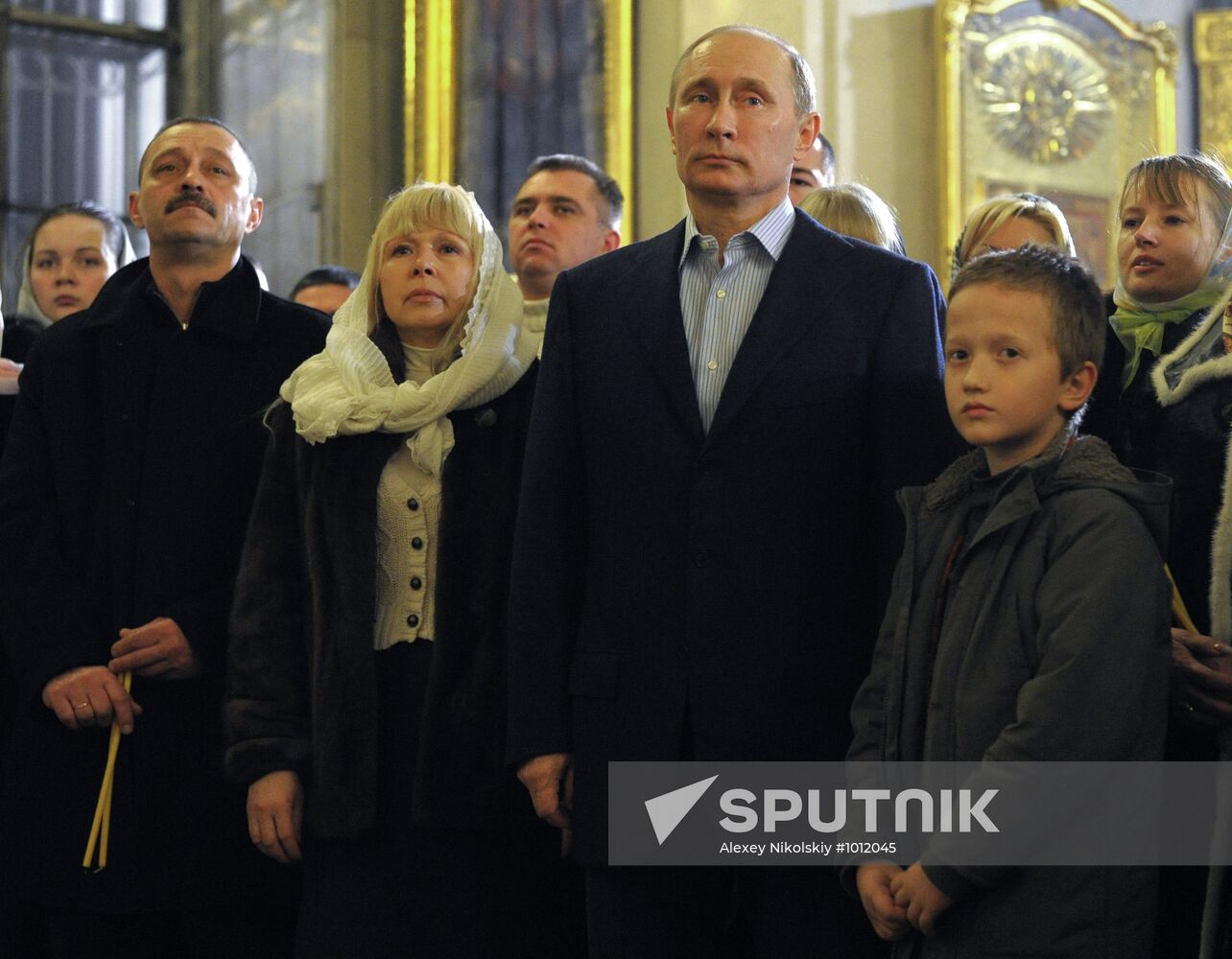 Vladimir Putin at Christmas service in St. Petersburg