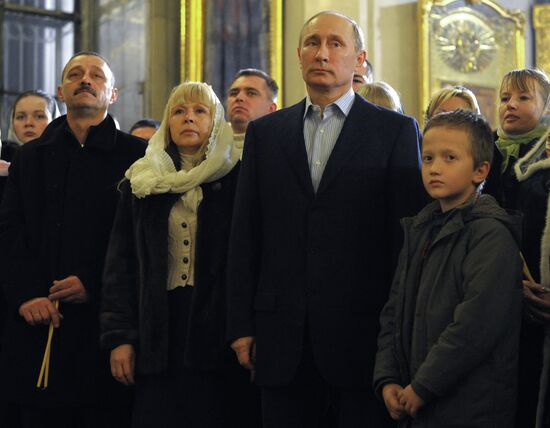 Vladimir Putin at Christmas service in St. Petersburg