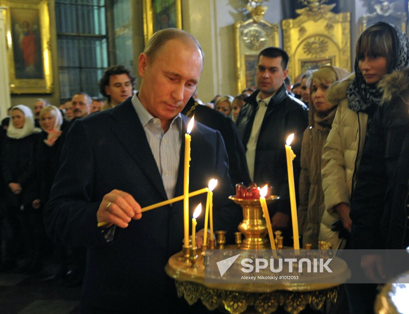 Vladimir Putin at Christmas service in St. Petersburg