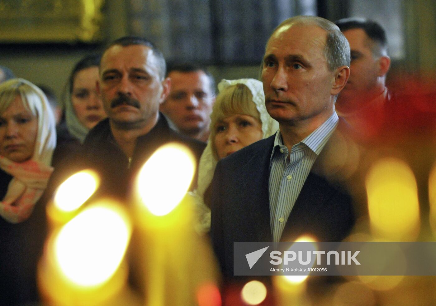 Vladimir Putin at Christmas service in St. Petersburg