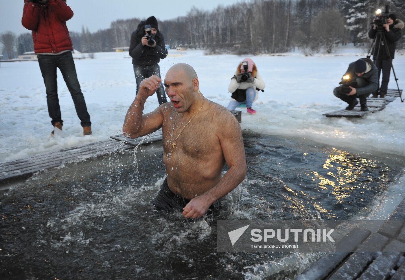 Nikolai Valuyev bathing in ice hole on Epiphany