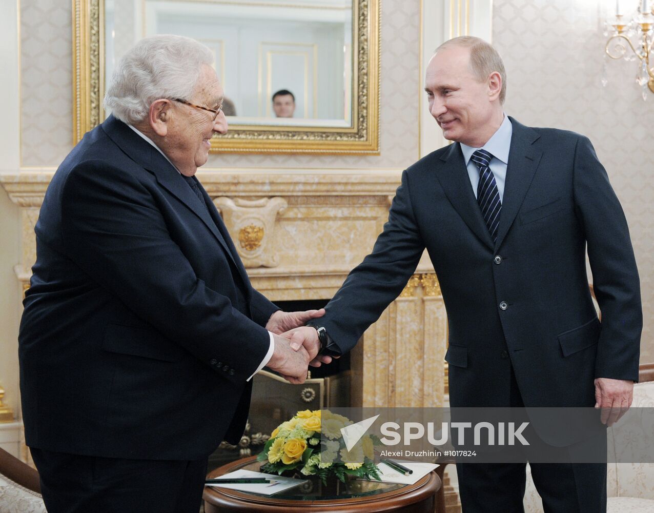 Vladimir Putin meets with Henry Kissinger in Moscow