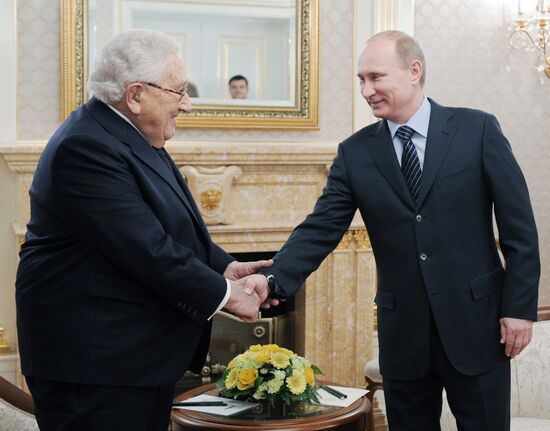 Vladimir Putin meets with Henry Kissinger in Moscow