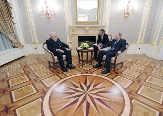 Vladimir Putin meets with Henry Kissinger in Moscow