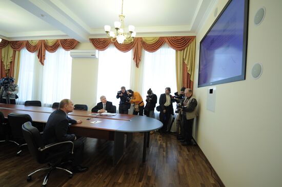 Vladimir Putin visits Federal Migration Service