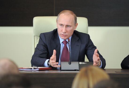 Vladimir Putin visits Federal Migration Service