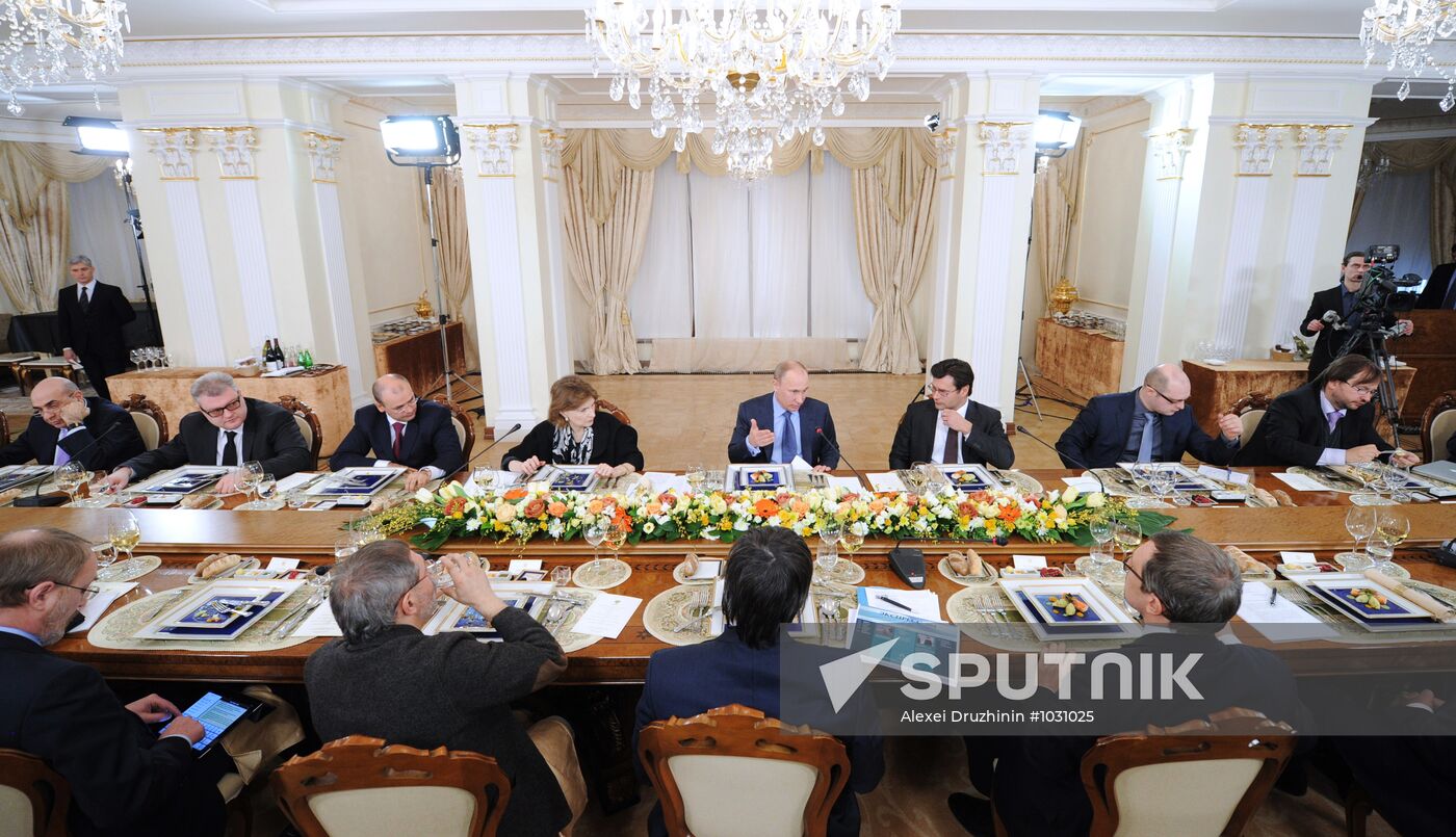 Vladimir Putin meets with political analysts at Novo-Ogaryovo