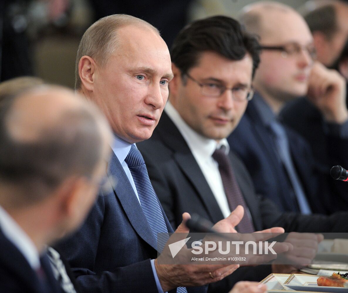 Vladimir Putin meets with political analysts at Novo-Ogaryovo