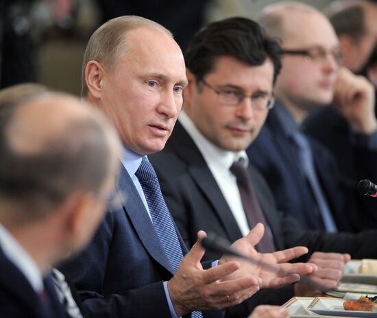 Vladimir Putin meets with political analysts at Novo-Ogaryovo