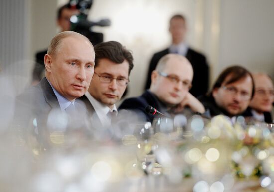 Vladimir Putin meets with political analysts at Novo-Ogaryovo