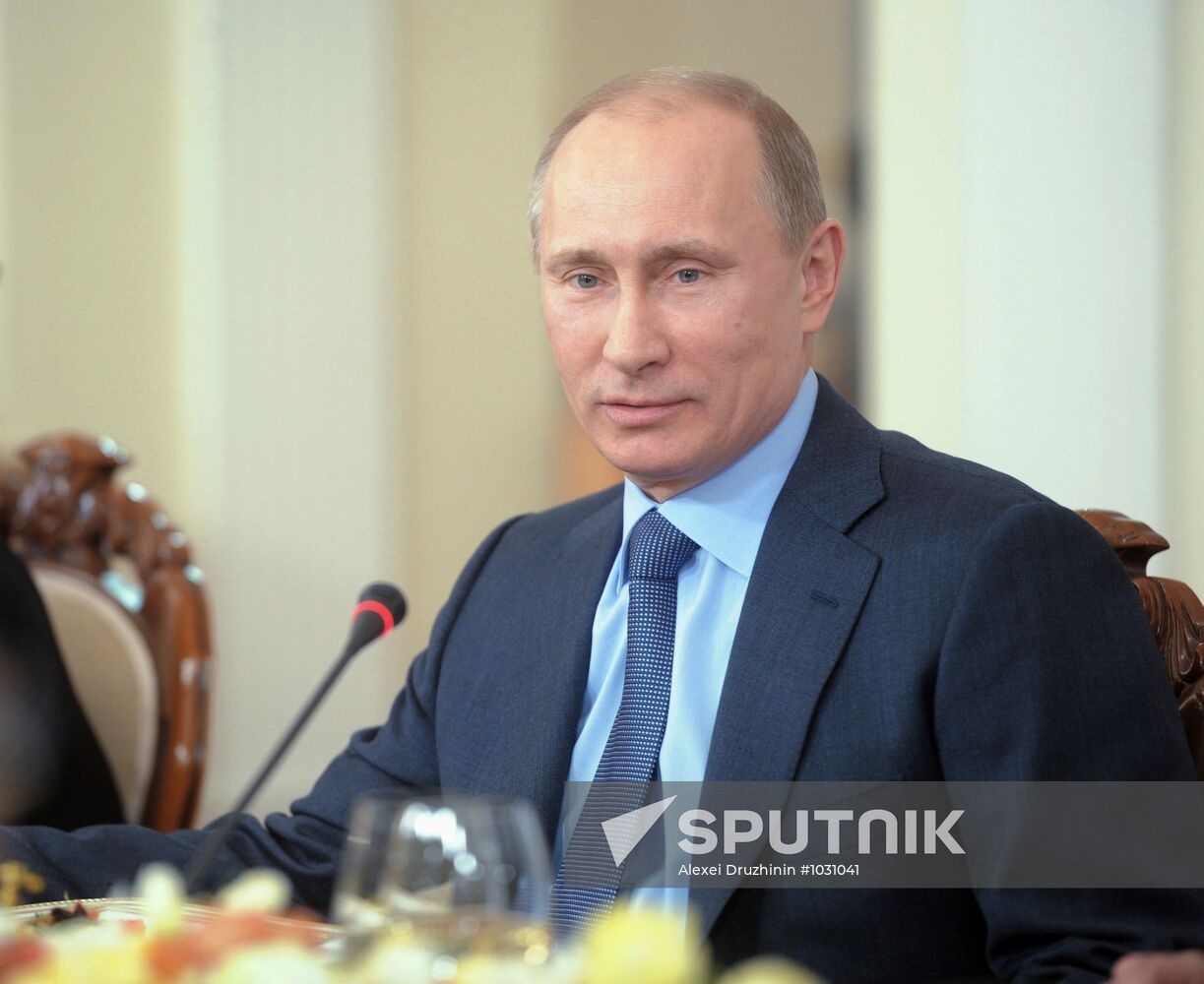 Vladimir Putin meets with political analysts at Novo-Ogaryovo