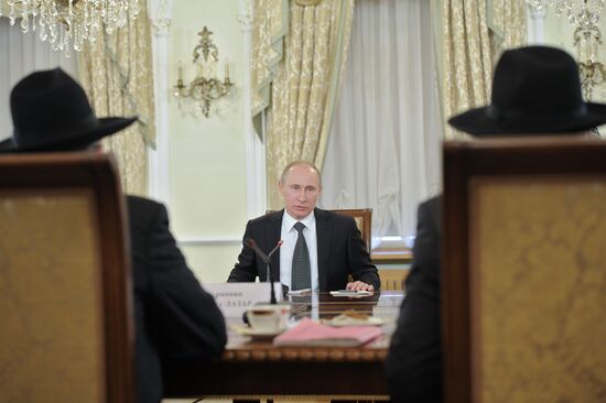 Putin meets with representatives of Russia's dominant religions
