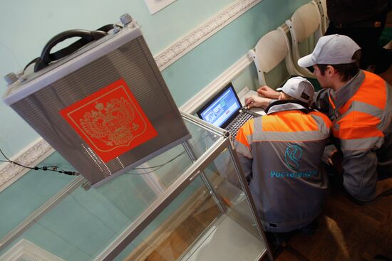 Installing equipment at polling station in St. Petersburg