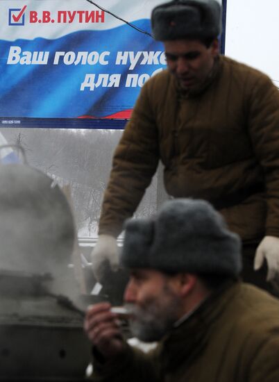 "Let's Defend Our Country!" march and rally in support of Putin
