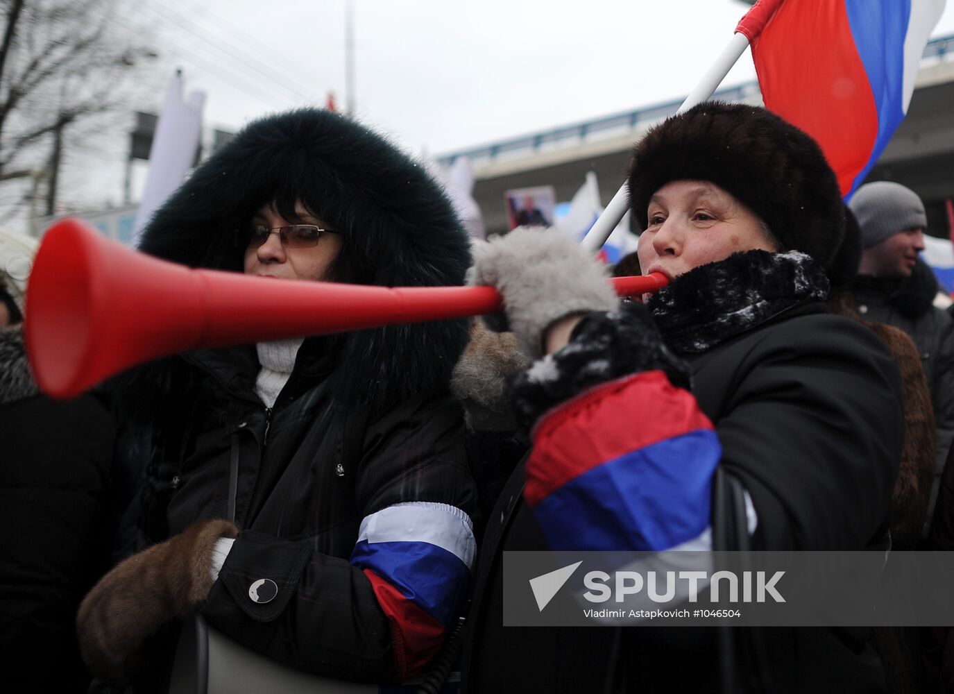 "Let's Defend Our Country!" march and rally in support of Putin