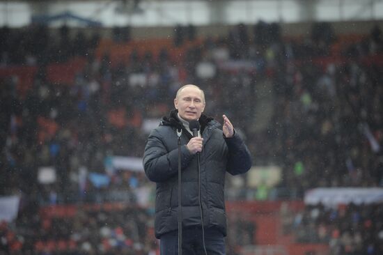 Putin speaks to his supporters at "Defend the Nation!" rally