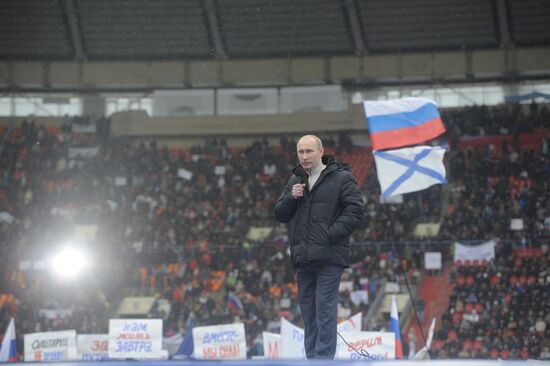 Putin speaks to his supporters at "Defend the Nation!" rally