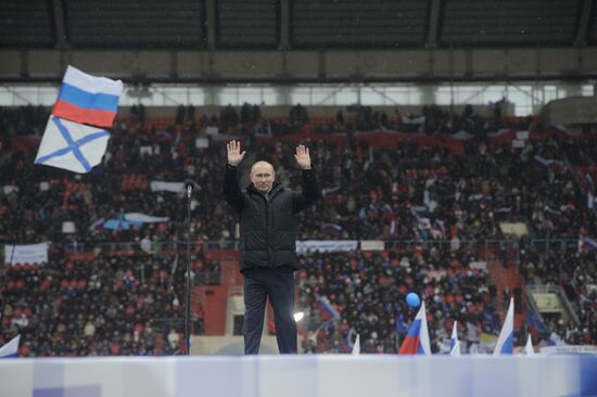 Putin speaks to his supporters at "Defend the Nation!" rally