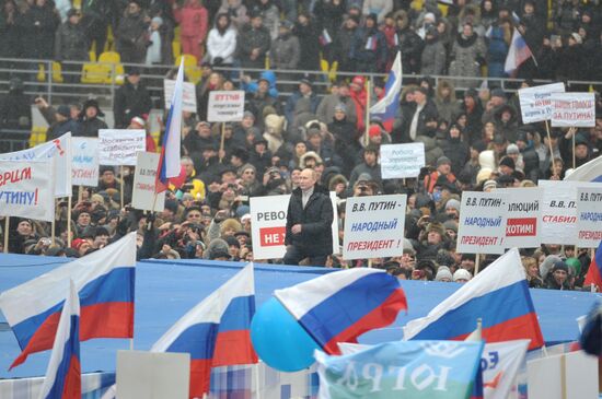 Putin speaks to his supporters at "Defend the Nation!" rally