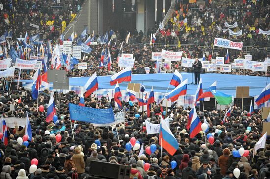 Putin speaks to his supporters at "Defend the Nation!" rally