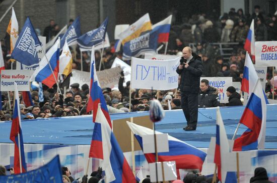 Putin speaks to his supporters at "Defend the Nation!" rally