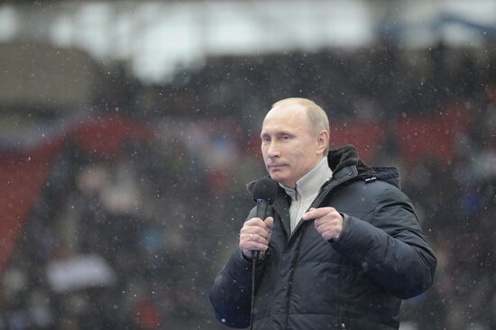 Putin speaks to his supporters at "Defend the Nation!" rally