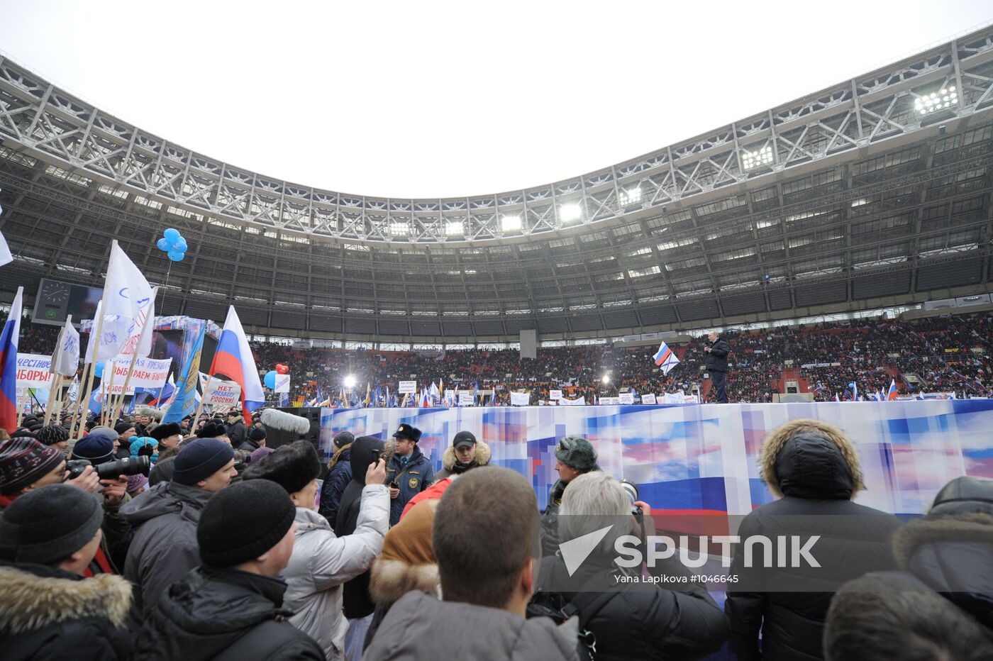Vladimir Putin speaks to supporters at "Defend the Nation!"rally
